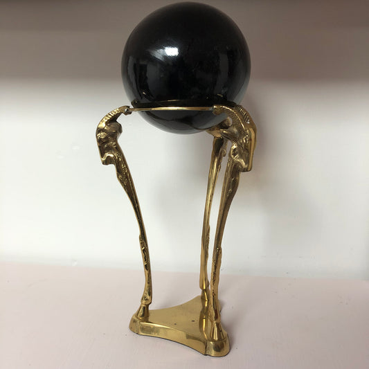 Brass Ram with Black Globe sculpture